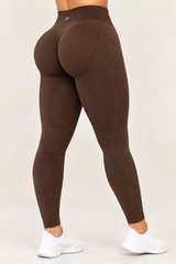 Legging seamfree de tiro alto STAGMI SMI1384 para mujer, vista posterior con detalles texturizados y diseño ajustado.